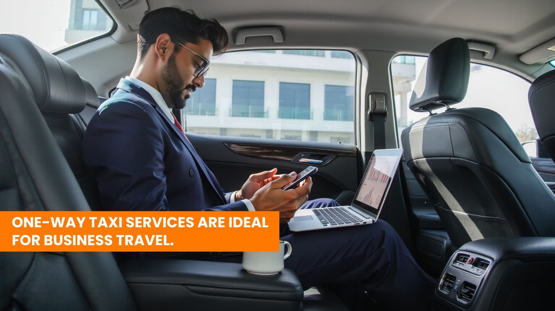  A man in a business suit sitting in the backseat of a car, working on his phone with a laptop open on his lap, and a coffee mug placed beside him. The image has an orange banner with white text that reads, "ONE-WAY TAXI SERVICES ARE IDEAL FOR BUSINESS TRAVEL."
